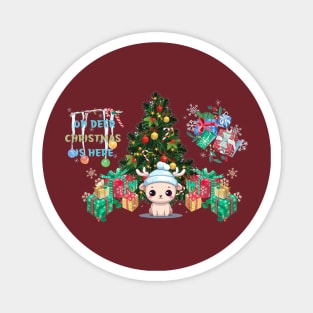 Reindeer sitting in front of the Christmas tree surrounded by presents Magnet